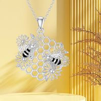 Pastoral Simple Style Sunflower Honeycomb Bee Alloy Hollow Out Gold Plated Silver Plated Women's Pendant Necklace main image 4
