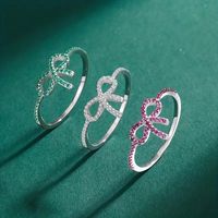 Wholesale IG Style Shiny Bow Knot Copper Hollow Out Inlay Zircon Rings main image 1