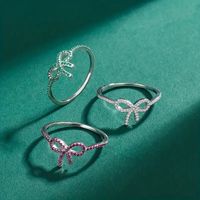 Wholesale IG Style Shiny Bow Knot Copper Hollow Out Inlay Zircon Rings main image 5