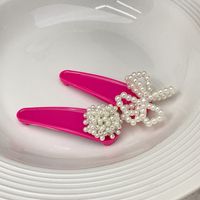Women's Cute Round Bow Knot Plastic Inlay Artificial Pearls Hair Clip main image 4