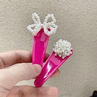 Women's Cute Round Bow Knot Plastic Inlay Artificial Pearls Hair Clip main image 3