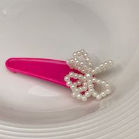 Women's Cute Round Bow Knot Plastic Inlay Artificial Pearls Hair Clip sku image 1