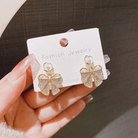 1 Pair Elegant Simple Style Flower Bow Knot Plating Inlay Alloy Artificial Pearls Rhinestones Drop Earrings main image 4