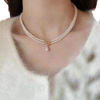 Simple Style Classic Style Solid Color Imitation Pearl Alloy Beaded Women's Layered Necklaces Necklace main image 3