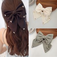 Women's Simple Style Bow Knot Cloth Rhinestones Pearl Hair Clip main image 1