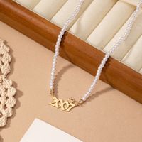 Elegant Simple Style Number Crown Artificial Pearl Alloy Beaded Gold Plated Women's Necklace main image 5