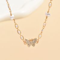 Elegant Simple Style Butterfly Alloy Plating Inlay Artificial Pearls Rhinestones Women's Choker main image 3