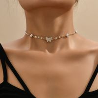 Elegant Simple Style Butterfly Alloy Plating Inlay Artificial Pearls Rhinestones Women's Choker main image 2