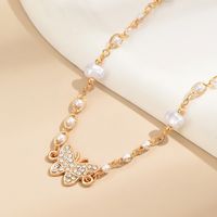 Elegant Simple Style Butterfly Alloy Plating Inlay Artificial Pearls Rhinestones Women's Choker main image 4