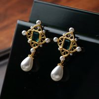 1 Pair Elegant Retro French Style Geometric Hollow Out Inlay Copper Artificial Pearls Zircon 18K Gold Plated Drop Earrings main image 4