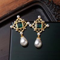 1 Pair Elegant Retro French Style Geometric Hollow Out Inlay Copper Artificial Pearls Zircon 18K Gold Plated Drop Earrings main image 3
