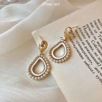 1 Par Estilo IG Gotitas De Agua Flor Nudo De Lazo Embutido Aleación Diamantes De Imitación Ópalo Perla Pendientes De Gota Aretes Pendientes sku image 22