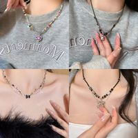 Simple Style Classic Style Butterfly Alloy Beaded Women's Layered Necklaces main image 1