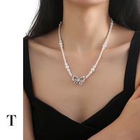 Sweet Simple Style Bow Knot Imitation Pearl Brass Zircon White Gold Plated Women's Pendant Necklace main image 3