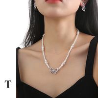 Sweet Simple Style Bow Knot Imitation Pearl Brass Zircon White Gold Plated Women's Pendant Necklace main image 4