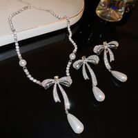 Elegant Sweet Bow Knot Imitation Pearl Alloy Rhinestones Women's Earrings Necklace main image 1