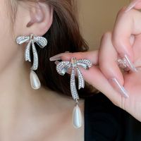 Elegant Sweet Bow Knot Imitation Pearl Alloy Rhinestones Women's Earrings Necklace main image 5