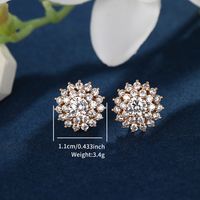 1 Pair Glam XUPING Shiny Round Flower Plating Inlay Alloy Copper Alloy Artificial Gemstones 18K Gold Plated Ear Studs main image 4