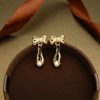 1 Pair Retro Bow Knot Inlay Copper Pearl Zircon 18K Gold Plated Drop Earrings main image 4