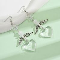 1 Pair Casual Simple Style Heart Shape Wings Flower Plating Hollow Out Arylic Drop Earrings sku image 1