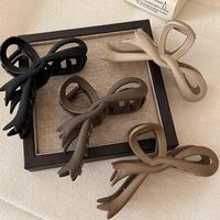 Women's Simple Style Bow Knot Arylic Hollow Out Hair Claws main image 1