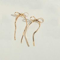 1 Paar Vintage-Stil Einfacher Stil Pendeln Bogenknoten Kupfer 14 Karat Vergoldet Tropfenohrringe sku image 1