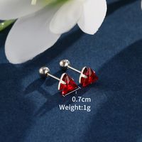 1 Pair XUPING Simple Style Shiny Triangle Inlay 304 Stainless Steel Artificial Gemstones 18K Gold Plated Raw Steel Ear Studs main image 6