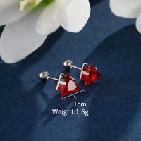 1 Pair XUPING Simple Style Shiny Triangle Inlay 304 Stainless Steel Artificial Gemstones 18K Gold Plated Raw Steel Ear Studs main image 7