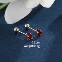 1 Pair XUPING Simple Style Shiny Triangle Inlay 304 Stainless Steel Artificial Gemstones 18K Gold Plated Raw Steel Ear Studs main image 5