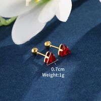 1 Pair XUPING Simple Style Shiny Triangle Inlay 304 Stainless Steel Artificial Gemstones 18K Gold Plated Raw Steel Ear Studs main image 9
