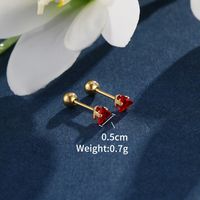 1 Pair XUPING Simple Style Shiny Triangle Inlay 304 Stainless Steel Artificial Gemstones 18K Gold Plated Raw Steel Ear Studs main image 8