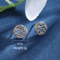 1 Pair XUPING Sweet Shiny Round Flower Hollow Out Inlay Alloy Copper Alloy Artificial Gemstones White Gold Plated Ear Studs main image 2