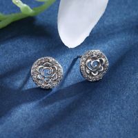 1 Pair XUPING Sweet Shiny Round Flower Hollow Out Inlay Alloy Copper Alloy Artificial Gemstones White Gold Plated Ear Studs main image 1