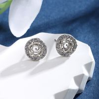 1 Pair XUPING Sweet Shiny Round Flower Hollow Out Inlay Alloy Copper Alloy Artificial Gemstones White Gold Plated Ear Studs main image 4
