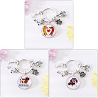 Cute Simple Style Dog Paw Print Unforgettable Alloy Glass Inlay Glass Bag Pendant Keychain main image 3