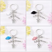 Simple Style Letter Cup Teeth Alloy Plating Bag Pendant Keychain main image 3