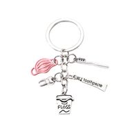 Style Simple Lettre Coupe Dents Alliage Placage Pendentif De Sac Porte-Clés main image 5