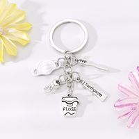 Simple Style Letter Cup Teeth Alloy Plating Bag Pendant Keychain sku image 3