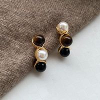 1 Pair Simple Style Geometric Inlay Brass Artificial Pearls Agate Tiger Eye Ear Studs main image 1