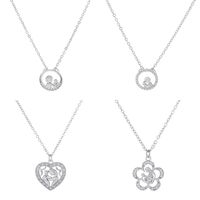 Cobre Chapados en oro de 18k Elegante Estilo Simple Forma De Corazón Ahuecar Embutido Diamantes De Imitación Collar Colgante main image 2