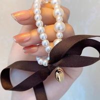 Women's Cute Sweet Bow Knot Artificial Pearl Beaded Hair Tie main image 2
