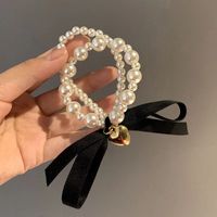 Women's Cute Sweet Bow Knot Artificial Pearl Beaded Hair Tie main image 4