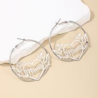 1 Pair Nordic Style Letter Heart Shape Hollow Out Alloy Hoop Earrings main image 4
