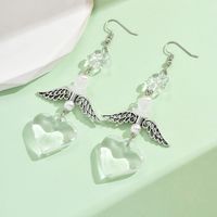 1 Pair Casual Simple Style Heart Shape Wings Flower Plating Hollow Out Arylic Drop Earrings main image 3