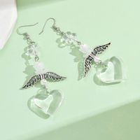 1 Pair Casual Simple Style Heart Shape Wings Flower Plating Hollow Out Arylic Drop Earrings main image 4