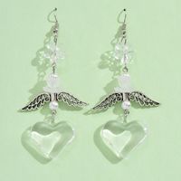 1 Pair Casual Simple Style Heart Shape Wings Flower Plating Hollow Out Arylic Drop Earrings main image 6