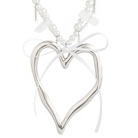 IG Style Elegant Heart Shape Bow Knot Imitation Pearl Alloy Beaded Women's main image 5