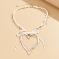 IG Style Elegant Heart Shape Bow Knot Imitation Pearl Alloy Beaded Women's main image 4