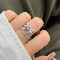 Wholesale IG Style Bow Knot Copper Plating Inlay Zircon Open Rings main image 1