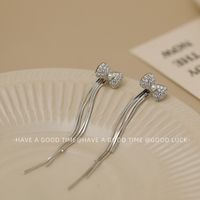 1 Pair Vintage Style Simple Style Bow Knot Tassel Inlay Copper Pearl Zircon 18K Gold Plated Drop Earrings main image 4